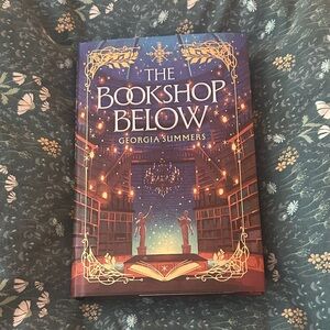 Illumicrate edition of The Bookshop Below by Georgia Summers